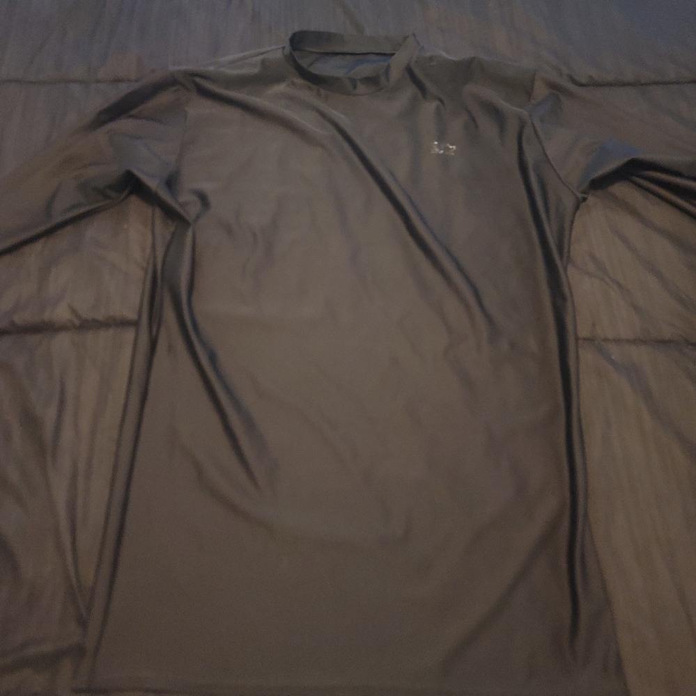 Starter. Athletic shirt. Fitted.  Small